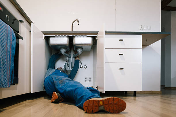 Professional Drain Cleaning technician working in Tariffville, CT